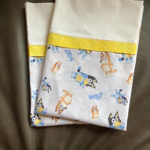 Buy 1 or 2.  Bluey and Family handmade fabric pillowcases. Supercute. Adults,teens,kids. 100% Cotton. 28x19 inches. Great Gift idea!