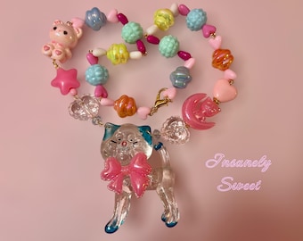 Collar de gato con premio de carnaval de lucita vintage kitsch