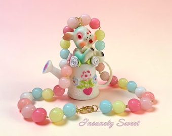 Collar de conejito vintage kitsch con regadera de primavera