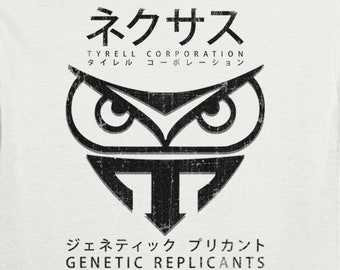 May include: White t-shirt with a black graphic of an owl with the text "Nexus", "Tyrell Corporation", "Genetic Replicants", "More Human Than Human", and "人間以上人間より" in Japanese.