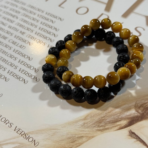 Taylor Swift Fearless, soul mate bracelets. Black lava rock and yellow tigers eye. Both bracelets included. Album not included.