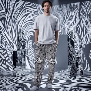 May include: A person wearing a light gray t-shirt and patterned pants with a black and white design. The pants have a unique abstract pattern with white accents. The background features a black and white zebra-like pattern.