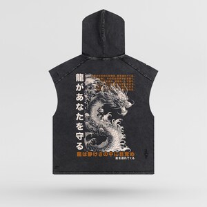 May include: A black sleeveless hoodie with a graphic print of a dragon and Japanese text that reads "龍があなたを守る" which translates to "The dragon protects you".