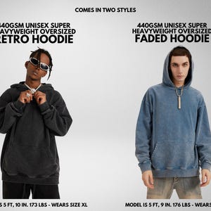 May include: Two models wearing hooded sweatshirts. The sweatshirt on the left is black and the sweatshirt on the right is blue. Both sweatshirts have the text "440GSM UNISEX SUPER HEAVYWEIGHT OVERSIZED" and the text "COMES IN TWO STYLES" is at the top of the image.