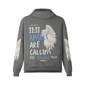 May include: A gray hoodie with the text "11:11 Angels Are Calling" and a graphic of angel wings. The hoodie also features angel wing graphics on the sleeves. The text "UNDERGROUND CULTURE" is printed above the main text.