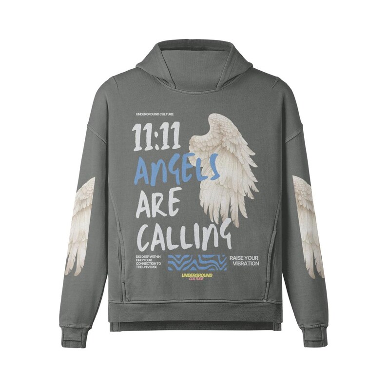 May include: A gray hoodie with the text "11:11 Angels Are Calling" and a graphic of angel wings. The hoodie also features angel wing graphics on the sleeves. The text "UNDERGROUND CULTURE" is printed above the main text.