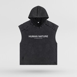 May include: A black sleeveless hoodie with a distressed look and a white logo that reads "HUMAN NATURE by Underground Culture".