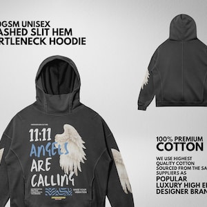 May include: Dark gray unisex turtleneck hoodie with a hood and a slit hem. The front features the text "11:11 Angels Are Calling" with angel wing graphics. Made of 100% premium cotton.
