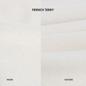 May include: Close-up of off-white French terry fabric. The image is split into two sections, with the left side labeled "INSIDE" showing a textured knit, and the right side labeled "OUTSIDE" showing a smooth, ribbed texture.
