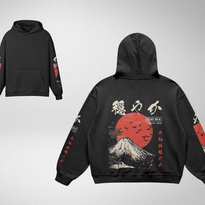 May include: Black hooded sweatshirt with a Japanese-inspired design featuring a red sun, a mountain, and Japanese characters. The text on the sweatshirt reads "GOAY AKA GENTLE - CALM".