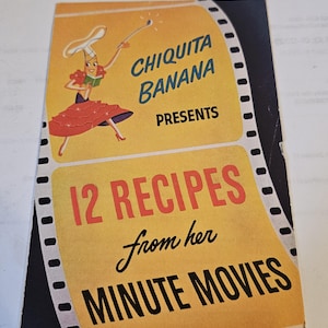 May include: A yellow and black vintage cookbook cover featuring a cartoon banana character wearing a chef's hat and holding a whisk. The text reads "Chiquita Banana Presents 12 Recipes from her Minute Movies".
