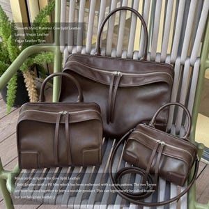 May include: Three brown leather bags of varying sizes are displayed. The bags have a zipper closure and a handle. The text on the image says "Smooth Style" and "Cow Split Leather". The bags are made of cow split leather, vegan leather lining, and vegan leather trim.