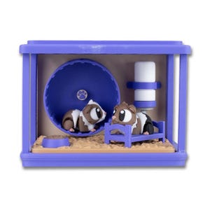 May include: A purple plastic hamster cage playset containing two small brown and white guinea pig figurines. One figurine sits inside a purple exercise wheel, while the other rests on a small purple bed. A white water bottle and bowl are included.