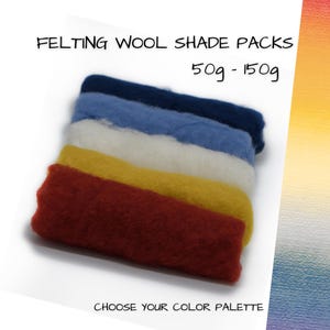 May include: Five rolls of felting wool in dark blue, light blue, white, yellow, and red. The text reads FELTING WOOL SHADE PACKS, 50g - 150g, and CHOOSE YOUR COLOR PALETTE. The wool has a soft, fibrous texture and is arranged in a horizontal stack.