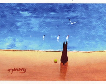 May include: A painting of a brown dog sitting on a sandy beach, looking out at the ocean. The ocean is blue with white sailboats in the distance. There is a green ball on the beach in front of the dog. The sky is blue with white clouds. The painting is signed "Young" in the bottom left corner.