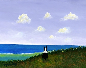 May include: A black and white dog sits on a grassy hill overlooking a blue ocean with a light blue sky and white clouds.
