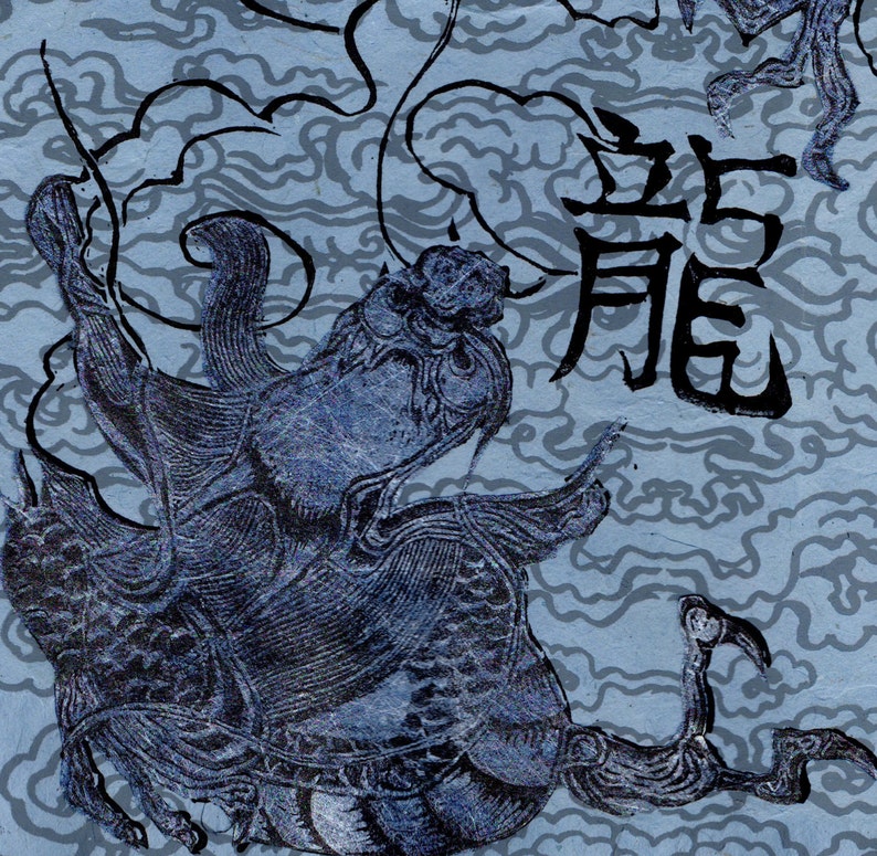 May include: A blue and white illustration of a dragon with the Chinese character for "dragon" written in black ink above it.