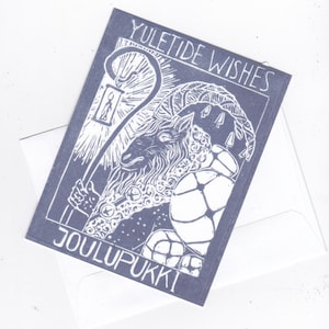 Cartes de Noël avec un image des linogravure du bouc de Yule ou chèvre de Noël finnois Joulupukki ou Julbock