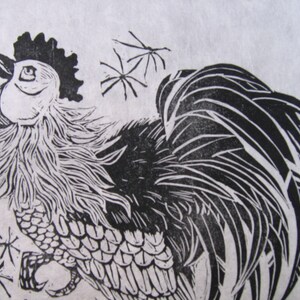 May include: Black and white linocut print of a rooster with a large comb and wattles. The rooster is facing to the right and has its wings spread out. The background is a light gray.