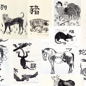 May include: A collection of 12 black and white woodblock prints depicting the Chinese zodiac animals. Each print features a different animal, including the rat, ox, tiger, rabbit, dragon, snake, horse, goat, monkey, rooster, dog, and pig. The prints are framed in white and have a simple, elegant design.