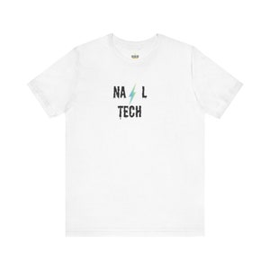 May include: White t-shirt with a black graphic of a lightning bolt and the text "NA L TECH" in a distressed font.