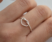 No me prometas nada. Corazón infinito . anillo de plata retorcida