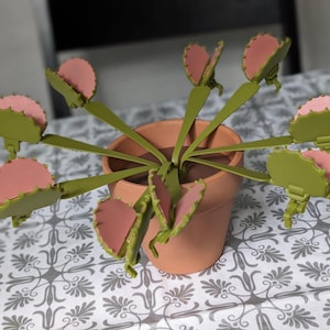 Venus Stack Trap with 4" terracotta pot.  Clips your chip bags! Each Stem has a Chip Clip That Stores on the Plant.