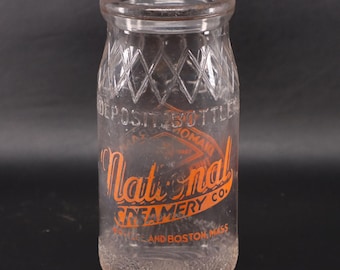 Botella de leche antigua de Boston, c. 1930, de la marca National Creamery, con forma de diamante y suela gruesa.