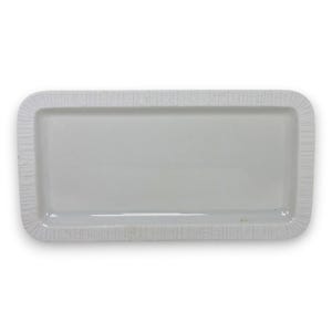 May include: A rectangular white ceramic serving tray with a smooth, glossy interior surface and a textured, ribbed border along the outer rim. The tray features rounded corners and a clean, uniform white finish throughout its entire structure.