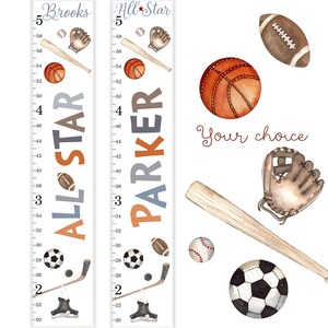 May include: Two white growth charts with a sports theme. The charts are labeled "Brooks All Star" and "Parker All Star". The charts feature a variety of sports equipment, including a baseball bat, a basketball, a football, a soccer ball, a hockey stick, and a baseball glove. The charts are designed to be used to track a child's growth.