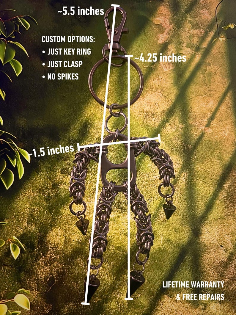 May include: A handmade, dark metal keychain featuring a stylized figure made of chainmail. The keychain is approximately 5.5 inches long, with a key ring and clasp. The figure has a 1.5-inch wide torso and 4.25-inch arms. Custom options include just a key ring, clasp, or no spikes.