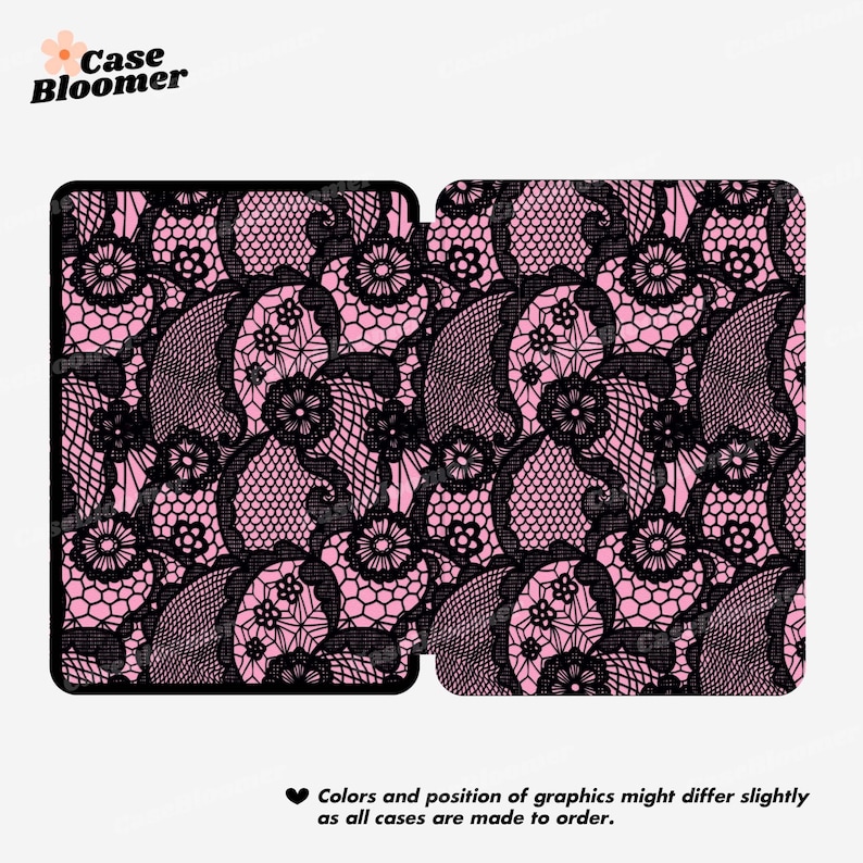 May include: A pink and black case with a lace pattern. The design features intricate black lace over a pink background. The text "Case Bloomer" is in the upper left corner. The text at the bottom says "Colors and position of graphics might differ slightly as all cases are made to order."