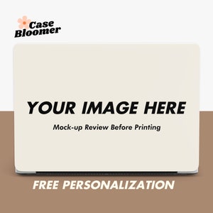 May include: A white laptop computer with a mock-up image placeholder that says "YOUR IMAGE HERE" and "Mock-up Review Before Printing". The laptop is on a brown surface with the text "FREE PERSONALIZATION" below it.