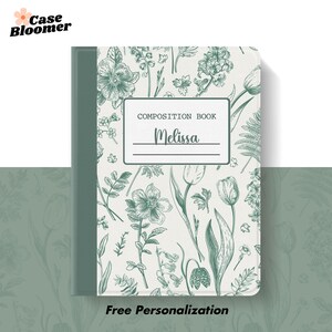May include: A composition book with a green cover and a floral pattern in green and white. The cover features the text "COMPOSITION BOOK" and the name "Melissa". The words "Free Personalization" are at the bottom.