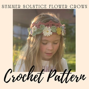 May include: A young person wearing a crocheted flower crown. The crown has crocheted flowers in white, yellow, and purple, with green leaves, set against a pinkish-brown band. Text reads "Summer Solstice Flower Crown" and "Crochet Pattern".