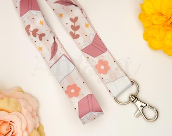 Orange Book Lanyard - Kawaii, Flower, Book , Plant, Sparkle, Writing, Pastel Design