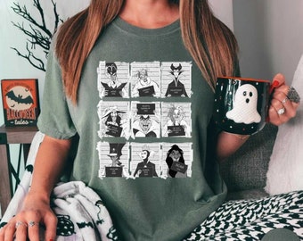 May include: A green t-shirt with a black and white graphic print of Disney villains in mugshots. The villains include Ursula, Maleficent, Cruella de Vil, and Scar. The text on the mugshots reads "WANTED", "FOR", "EVIL", and "CRIMES AGAINST", followed by the villain's name.