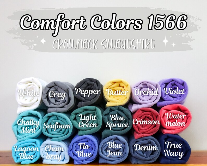 K&ouml;nnte beinhalten: Comfort Colors 1566 Crewneck Sweatshirt in verschiedenen Farben, darunter Wei&szlig;, Grau, Pfeffer, Butter, Orchidee, Violett, Kreide-Minze, Schaum, Hellgr&uuml;n, Blauer Fichte, Scharlachrot, Wassermelone, Lagunenblau, Champagner, Floblau, Jeansblau, Denim und Dunkelblau.