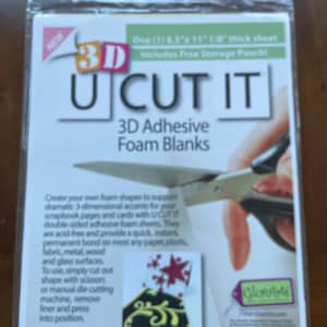 May include: A package of 3D U CUT IT adhesive foam blanks. The package is white with a green and white label. The label has the text "3D U CUT IT" in black and white. The label also has the text "3D Adhesive Foam Blanks" in black and white. The package includes a free storage pouch. The package is new and has a red "NEW" sticker on it.