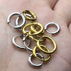 Rostfria klickringar för sträckta öron: Gauge-smycken