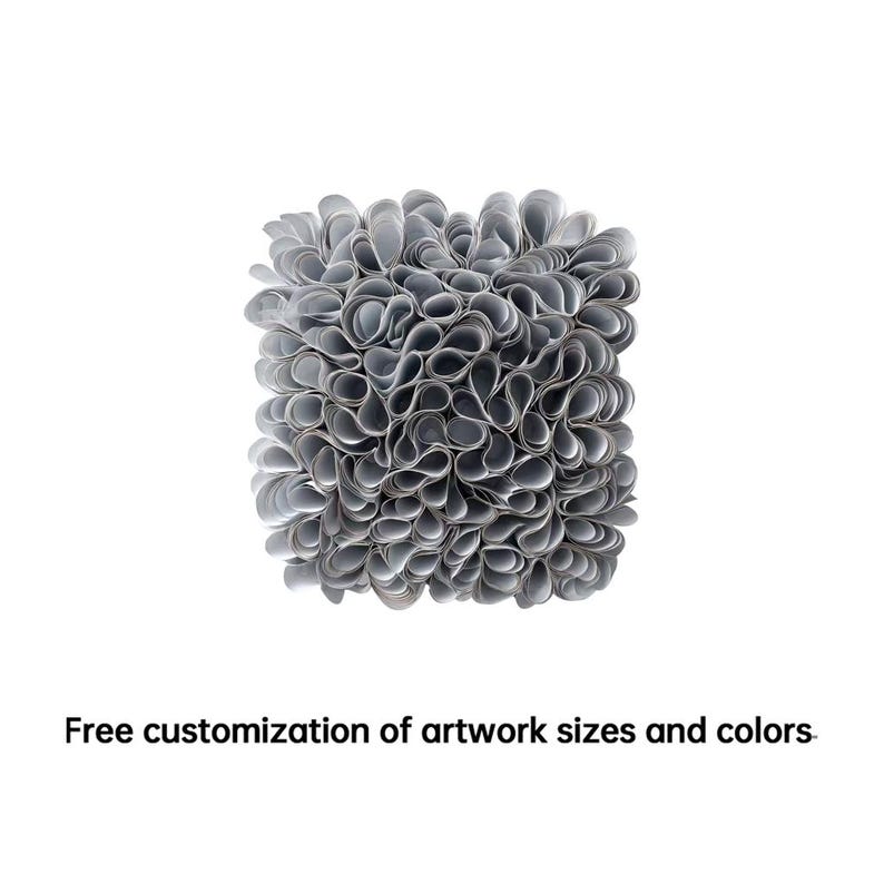 May include: A square artwork featuring a dense arrangement of folded grey paper elements. The overlapping papers create a textured surface. The text at the bottom says: Free customization of artwork sizes and colours.