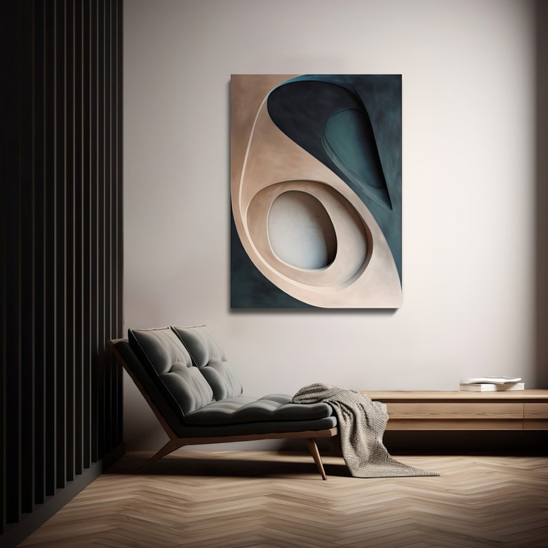 May include: Abstract wall art featuring a layered design with beige, teal, and dark blue hues. The artwork is displayed above a modern gray lounge chair with a wooden frame, complemented by a neutral-toned throw blanket. The room has a minimalist aesthetic.