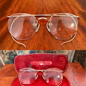 Vintage Imperal gold filled rimless eyeglass frames with horn nose rests
