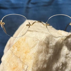 1990s Gold and Wood Paris gold plated rimless glasses with horn arm detailing
