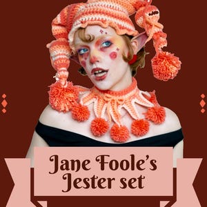 May include: A crochet jester set featuring a multi-pointed hat with orange and white stripes and hanging pom-poms, paired with a matching ruffled collar adorned with orange pom-poms. The text Jane Foole's Jester set is displayed on a banner.