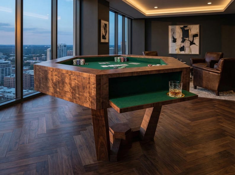 May include: A custom-made, octagonal poker table with a rich, dark wood finish. The table features a green felt playing surface and a built-in drink shelf. Stacks of poker chips and playing cards are visible on the table.