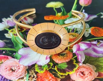 Brazalete de ónix, luna y estrellas