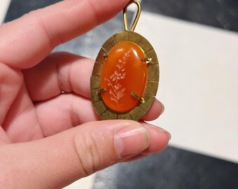 Colgante de pared con espuela de caballero de ónix rojo