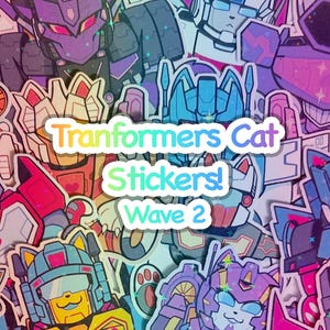 May include: A collection of colorful stickers featuring cartoon robots with cat faces. The stickers are in various colors, including orange, purple, blue, and yellow. Text on the stickers reads "Tranformers Cat Stickers! Wave 2."