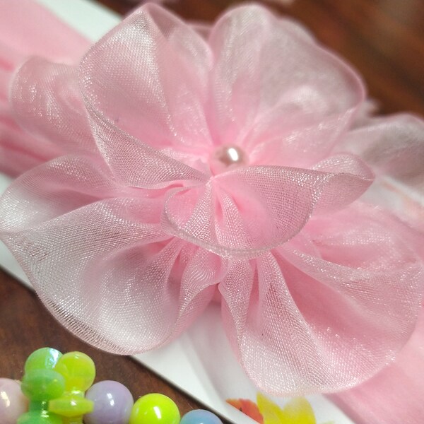 pink, red, and white organza ribbon flowers